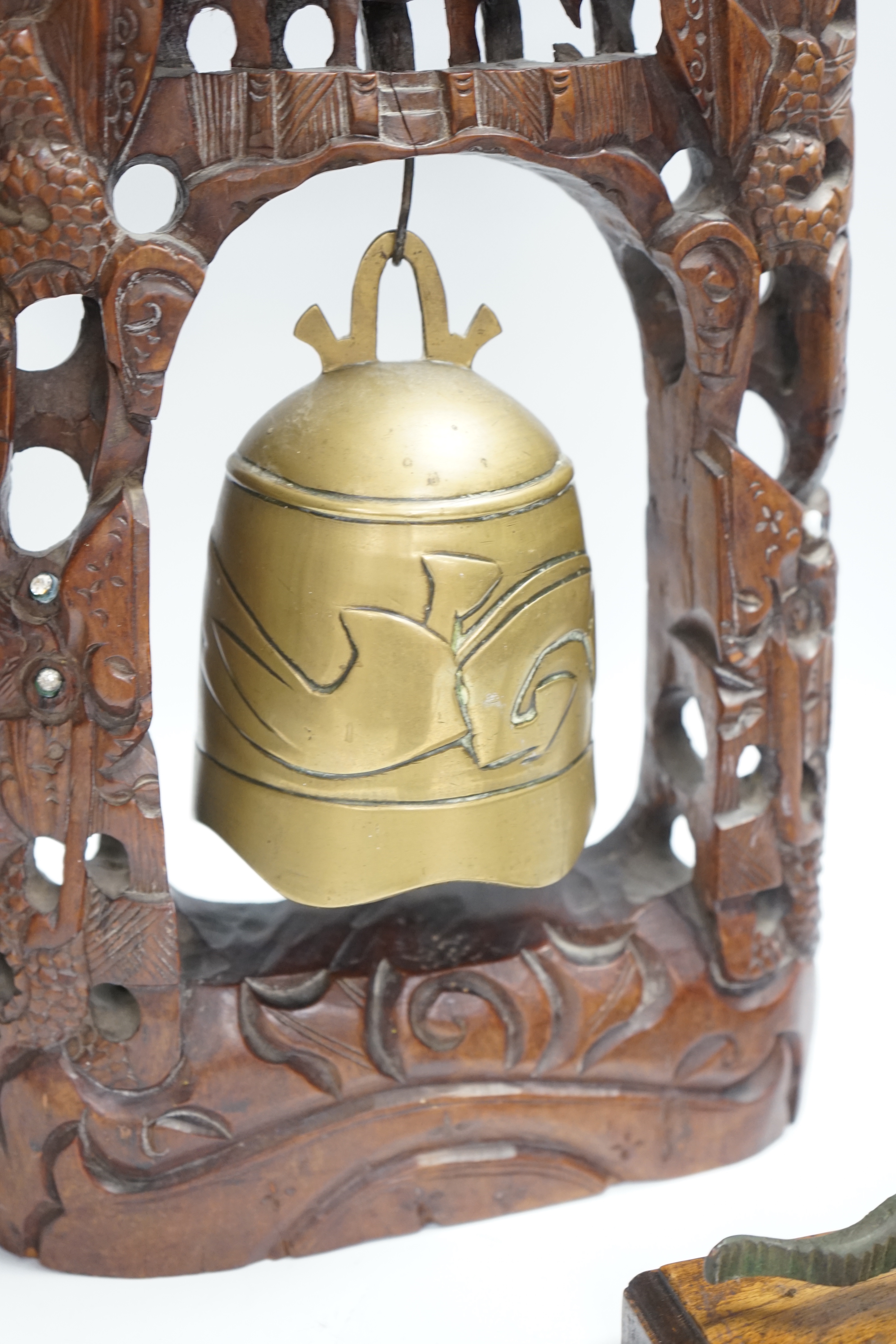 A Chinese table bell, pewter tea canister and an Indian ‘cobra’ hook, bell in frame 34.5cm high